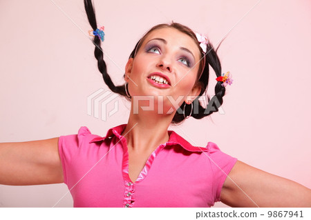 picture of surprised woman hair in pigtail 9867941