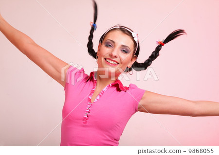 picture of surprised woman hair in pigtail 9868055