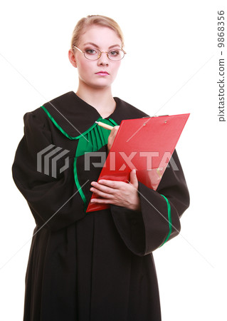 Woman lawyer attorney in classic polish gown writing on clipboard 9868356