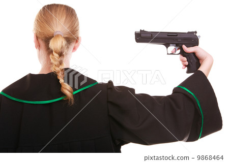 Woman lawyer attorney in polish black green gown with gun 9868464