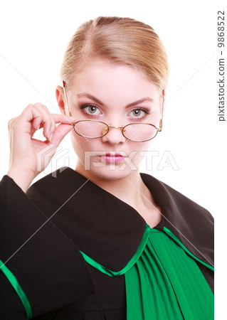 Young female lawyer attorney wearing classic polish black green gown Young female lawyer attorney wearing classic polish black green gown 9868522