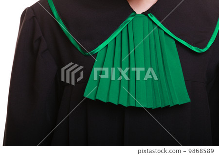 Law justice. Closeup lawyer attorney classic polish black green gown 9868589
