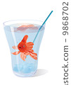 Golden fish swims in a glass with ice 9868702