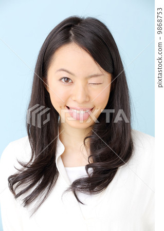 A girl who takes a tongue out A girl who takes a tongue out 9868753