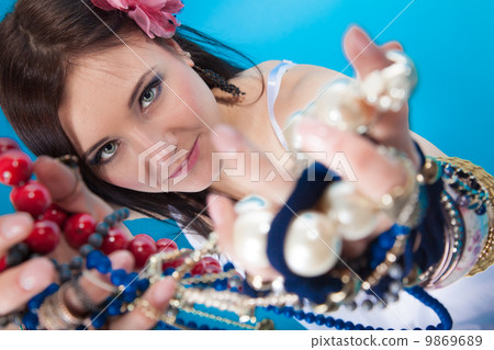 summer girl plenty of jewellery beads in hands summer girl plenty of jewellery beads in hands 9869689