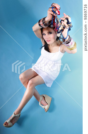 summer girl plenty of jewellery beads in hands summer girl plenty of jewellery beads in hands 9869716