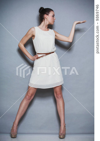 Fashion photo of young woman. Girl posing. Studio photo Fashion photo of young woman. Girl posing. Studio photo 9869746
