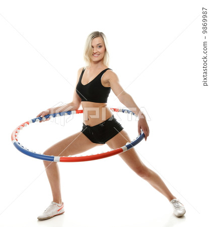 young fitness woman with hula hoop isolated 9869987