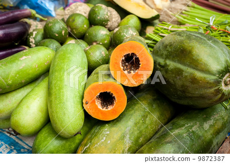 Papaya and fresh organic vegetables and fruits at asian market Papaya and fresh organic vegetables and fruits at asian market 9872387