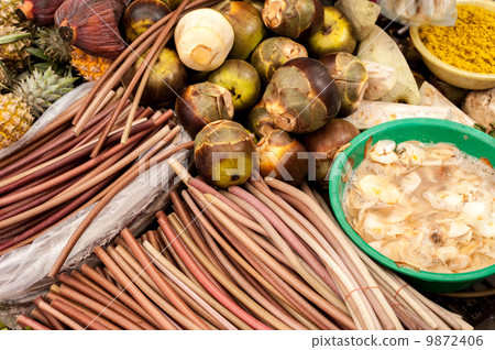 Exotic tropical fruits and vegetables at traditional asian food 9872406