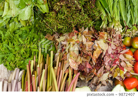 Fresh organic herbs, spices and liliy stems at asian market 9872407
