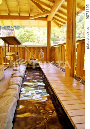A footbath in the historic villages of Shirakawa-go in Gifu Prf. 9873895