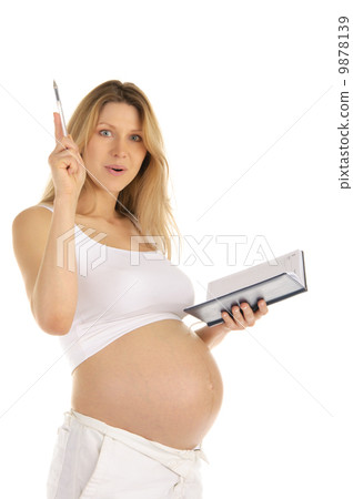 astonished at the pregnant woman with a notepad astonished at the pregnant woman with a notepad 9878139