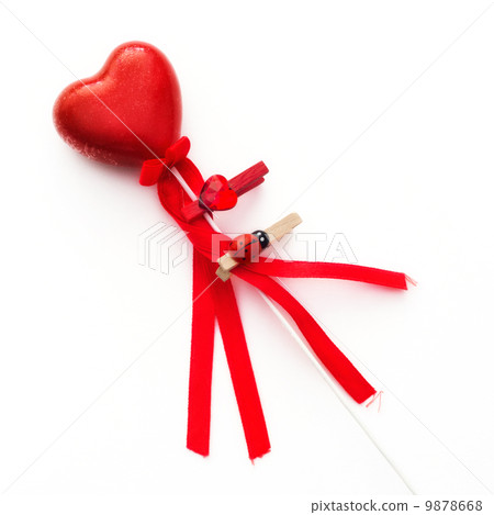 Red decorative valentine heart on a wand Red decorative valentine heart on a wand 9878668