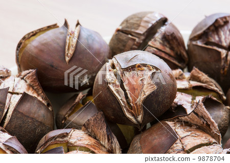 Pile of roasted chestnuts Pile of roasted chestnuts 9878704