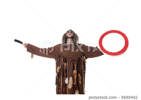 Studio shot of focused shaman looking up Studio shot of focused shaman looking up 9880482