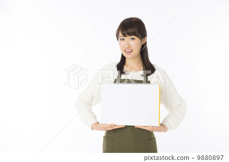 A woman in an apron 9880897