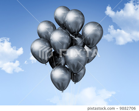 silver balloons on a blue sky silver balloons on a blue sky 9882706