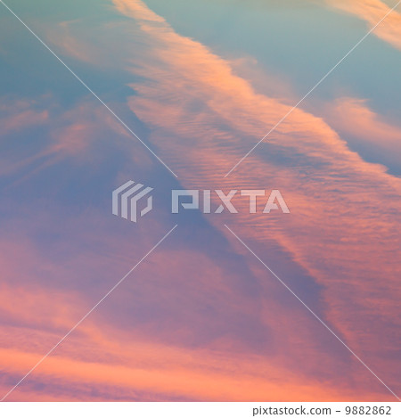 evening blue sky with pink sunset clouds 9882862