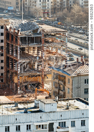 demolition of old house on urban street demolition of old house on urban street 9882863