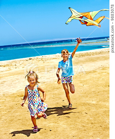Kid flying kite outdoor. Kid flying kite outdoor. 9883078