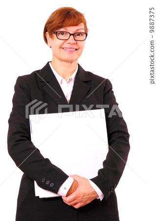 Mature red haired businesswoman with white office folder 9887375