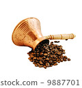 Cezve and freshly roasted coffee, isolation 9887701