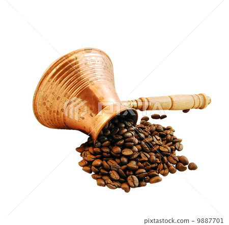Cezve and freshly roasted coffee, isolation Cezve and freshly roasted coffee, isolation 9887701