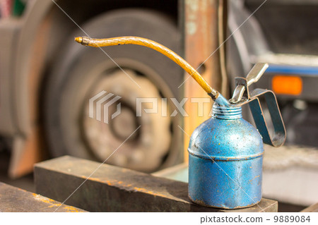 Old oil can in the garage Old oil can in the garage 9889084