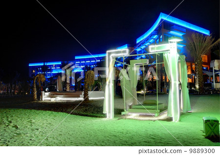 Night illumination of the modern luxury hotel, Dubai, UAE 9889300