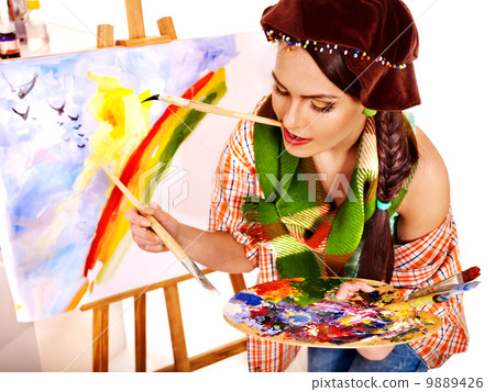 Female artist at work. 9889426