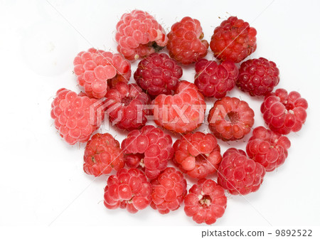 Ripe berries of raspberry on white background.. 9892522