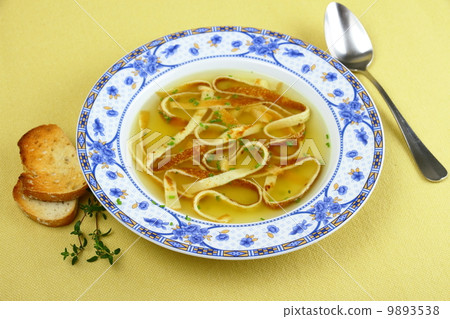 Pancake soup in blue plate with bread Pancake soup in blue plate with bread 9893538