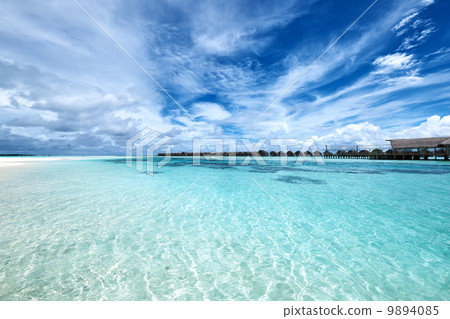 Beautiful beach with water bungalows Beautiful beach with water bungalows 9894085