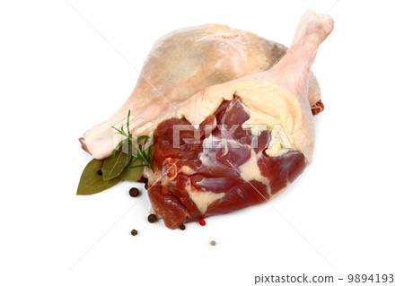 Fresh duck leg with spices and bay leaf Fresh duck leg with spices and bay leaf 9894193