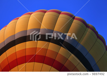 Hot air balloon on blue sky 9897492