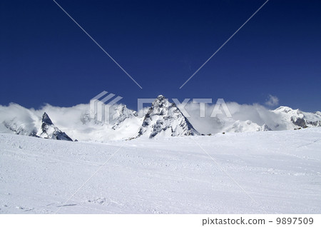 Ski slope at nice sunny day Ski slope at nice sunny day 9897509