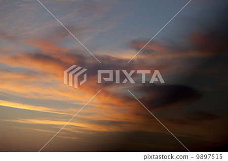 Fiery sunrise sky on summer sea Fiery sunrise sky on summer sea 9897515