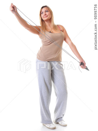 young fitness woman with jump rope isolated 9899756
