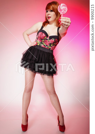 happy redhair woman with lollipop candy happy redhair woman with lollipop candy 9900215
