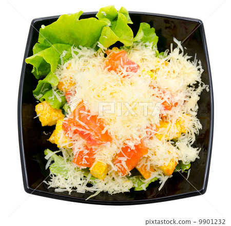 caesar salad in black bowl 9901232