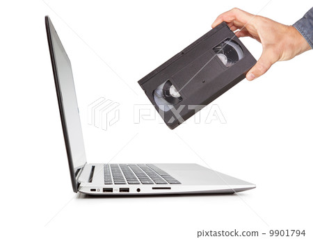 The concept of a video cassette technology in the hand compared 9901794