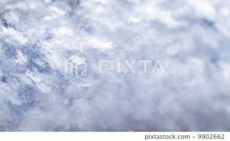 Snowflake in blue snow Snowflake in blue snow 9902662