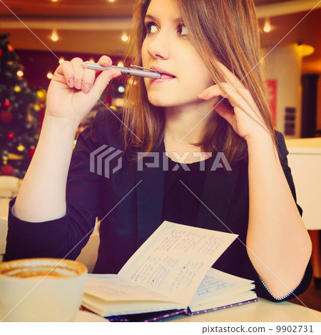 young woman with notebook young woman with notebook 9902731