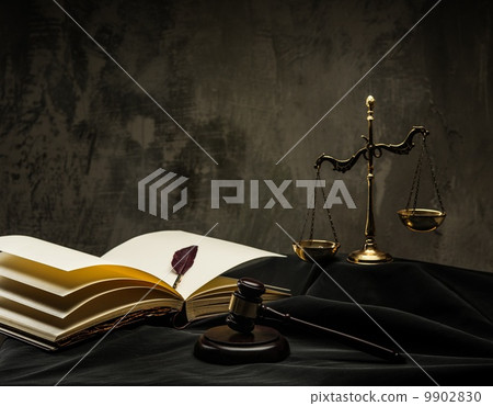 Scales and wooden hammer on judge's mantle Scales and wooden hammer on judge's mantle 9902830