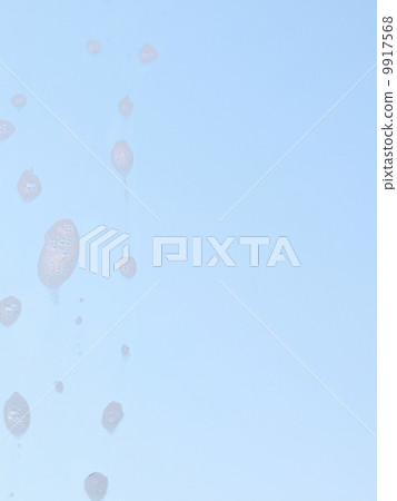 Drops on the windowpane cleaning window 9917568