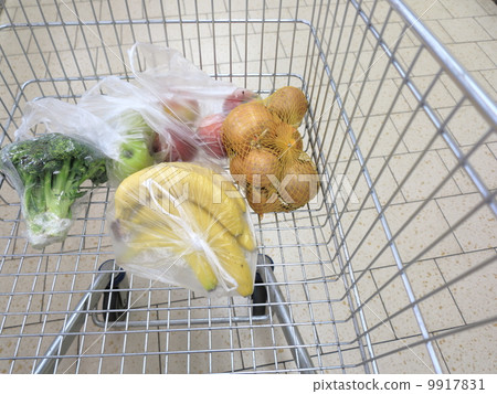 shopping cart with grocery at supermarket shopping cart with grocery at supermarket 9917831