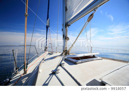 Sailboat yacht sailing in blue sea. Tourism 9918057