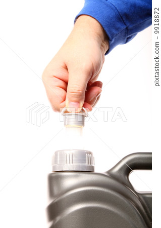 hand opening can with car engine oil isolated hand opening can with car engine oil isolated 9918872