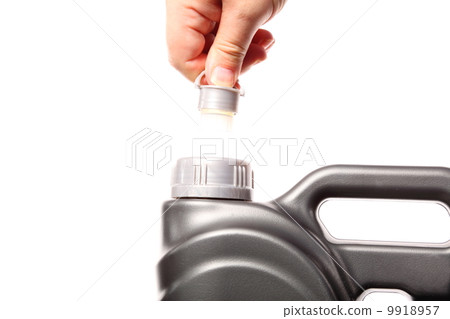 hand opening can with car engine oil isolated 9918957